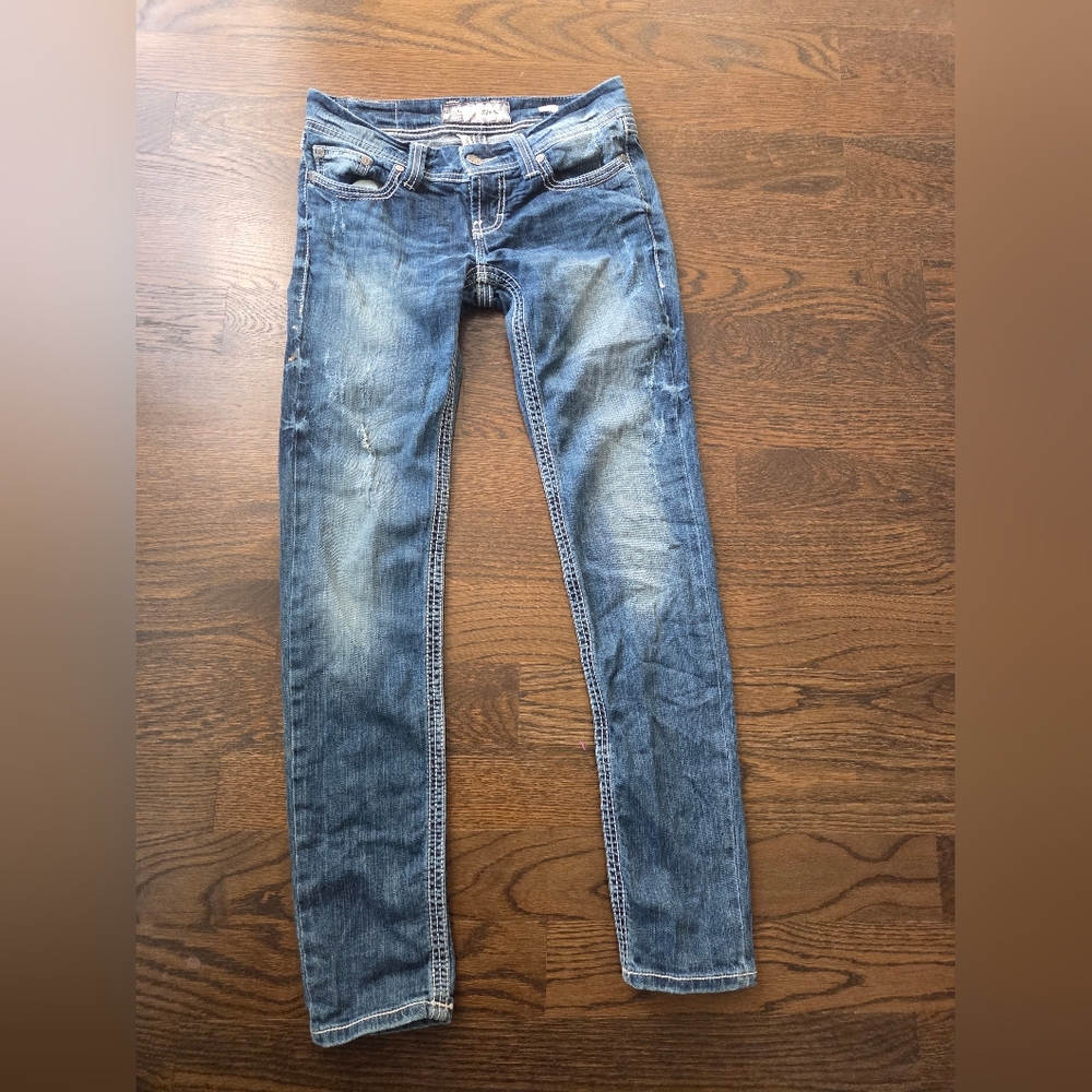Woman’s BKE skinny jeans 28